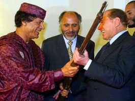 berlusconi accusato di aver intimato di uccidere Gheddafi